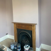 painted wall above fireplace